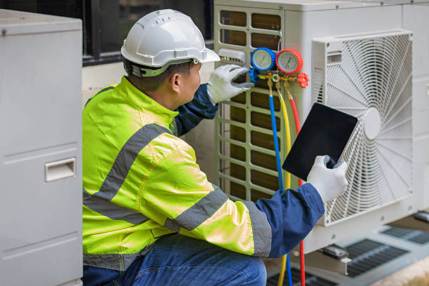 Professional Air Conditioning Repair technician working in Howe, IN